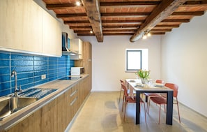 Fridge, microwave, cookware/dishes/utensils