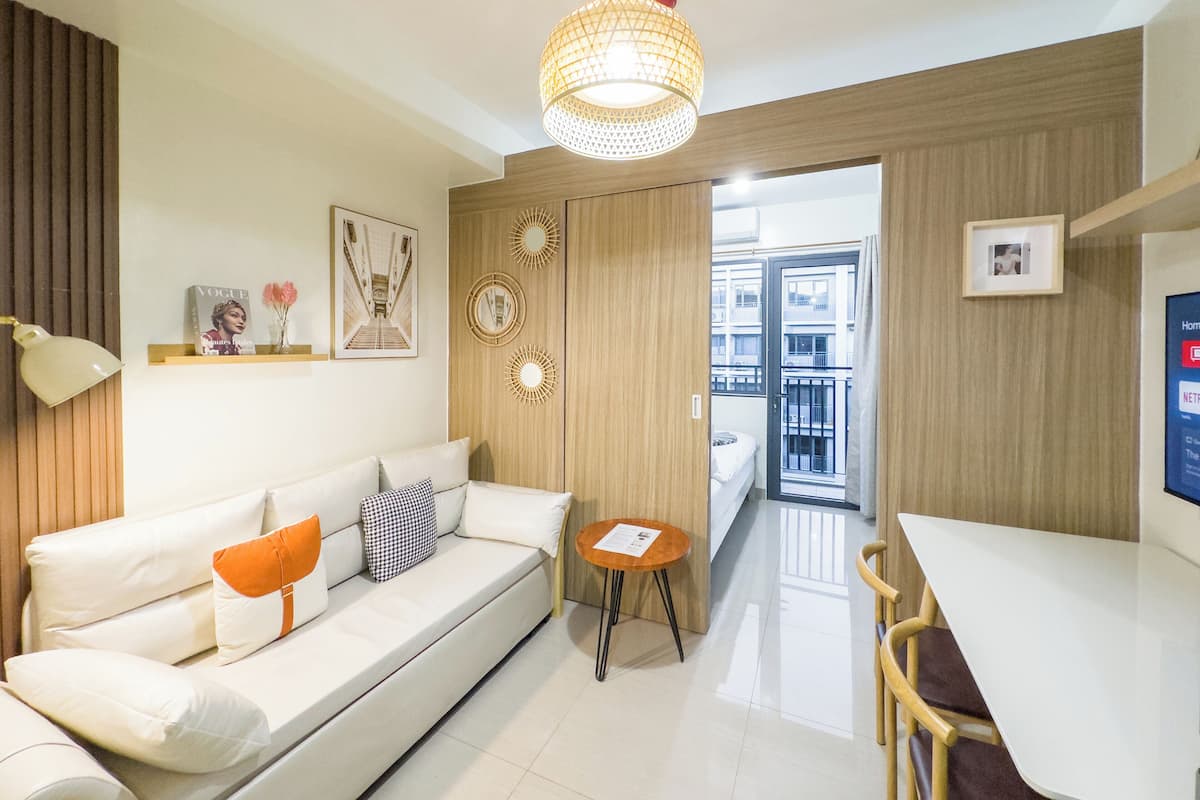 Family Condo, Non Smoking, Balcony | Living area | 43-inch flat-screen TV with digital channels