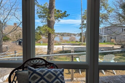 Water-view house near golf with firepit, grill, deck, central AC & washer/dryer