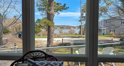 Water-view house near golf with firepit, grill, deck, central AC & washer/dryer
