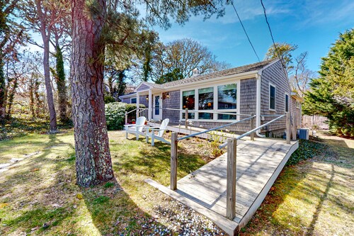 Water-view house near golf with firepit, grill, deck, central AC & washer/dryer