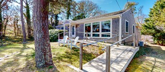 Water-view house near golf with firepit, grill, deck, central AC & washer/dryer