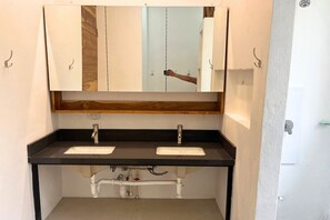 Shower, towels, soap, toilet paper