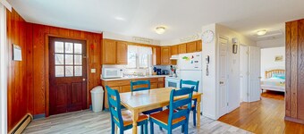 Riverfront gem features, outdoor shower, gas grill, deck, river views, W/D