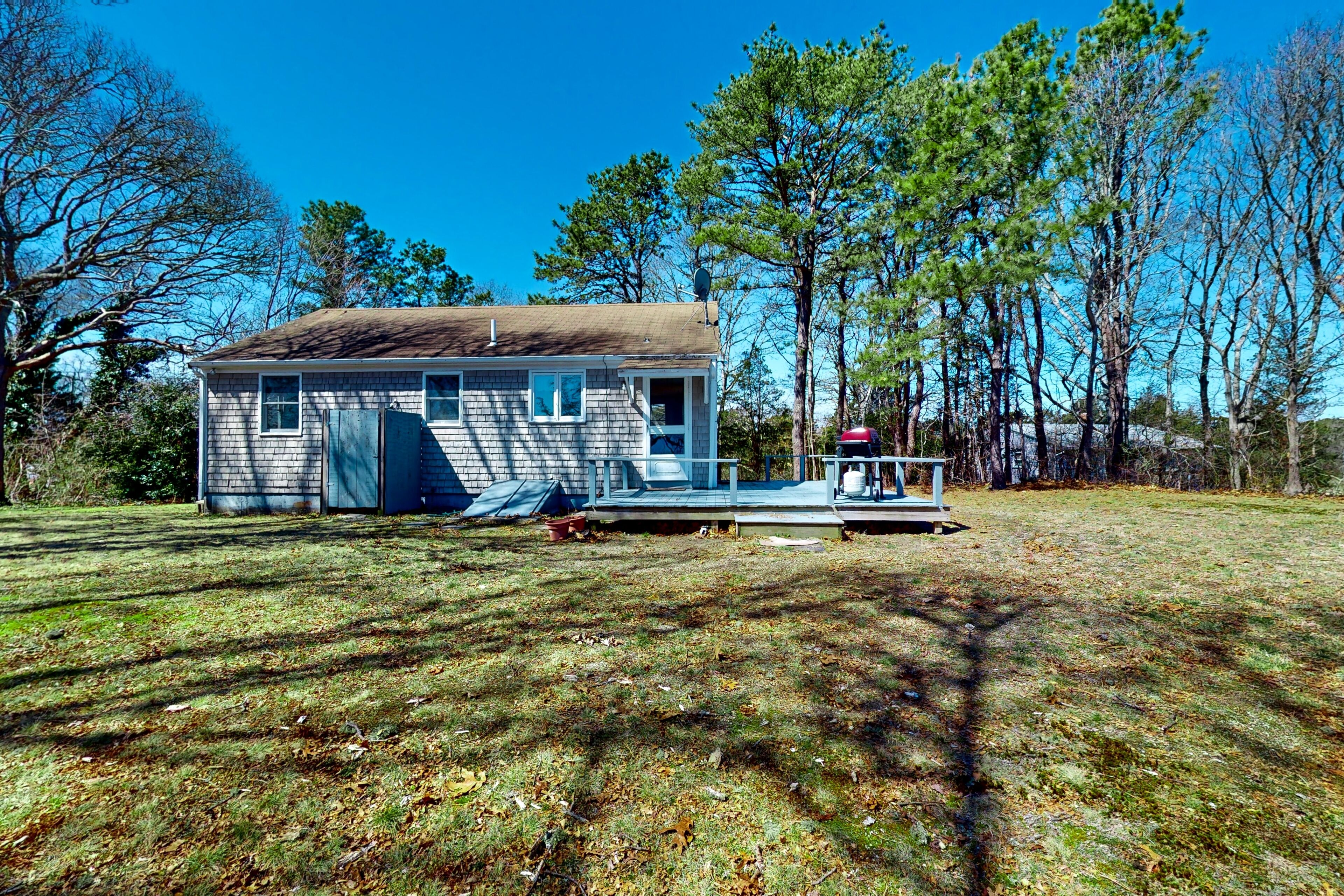 Dog-friendly riverfront home with outdoor shower, grill, deck, river views, W/D