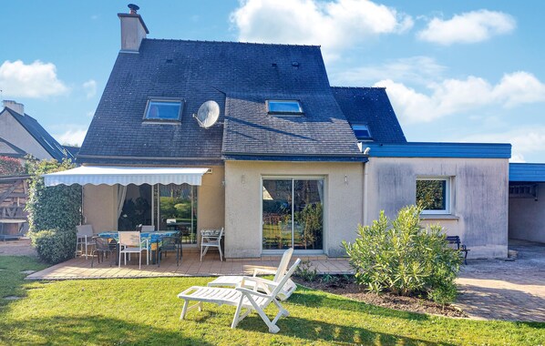 Enjoy outdoor dining or relaxation on the covered patio.
