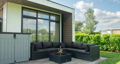 Fine chalet with a garden in a small park