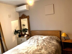 1 bedroom, desk, iron/ironing board, travel cot
