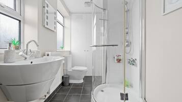 Shower, hair dryer, towels, soap