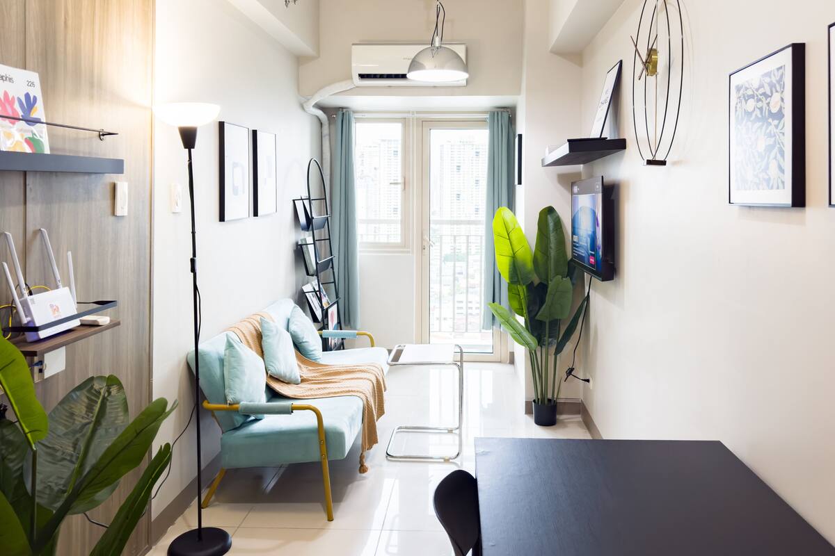 Design Condo, Non Smoking, City View | Living area | 43-inch flat-screen TV with digital channels