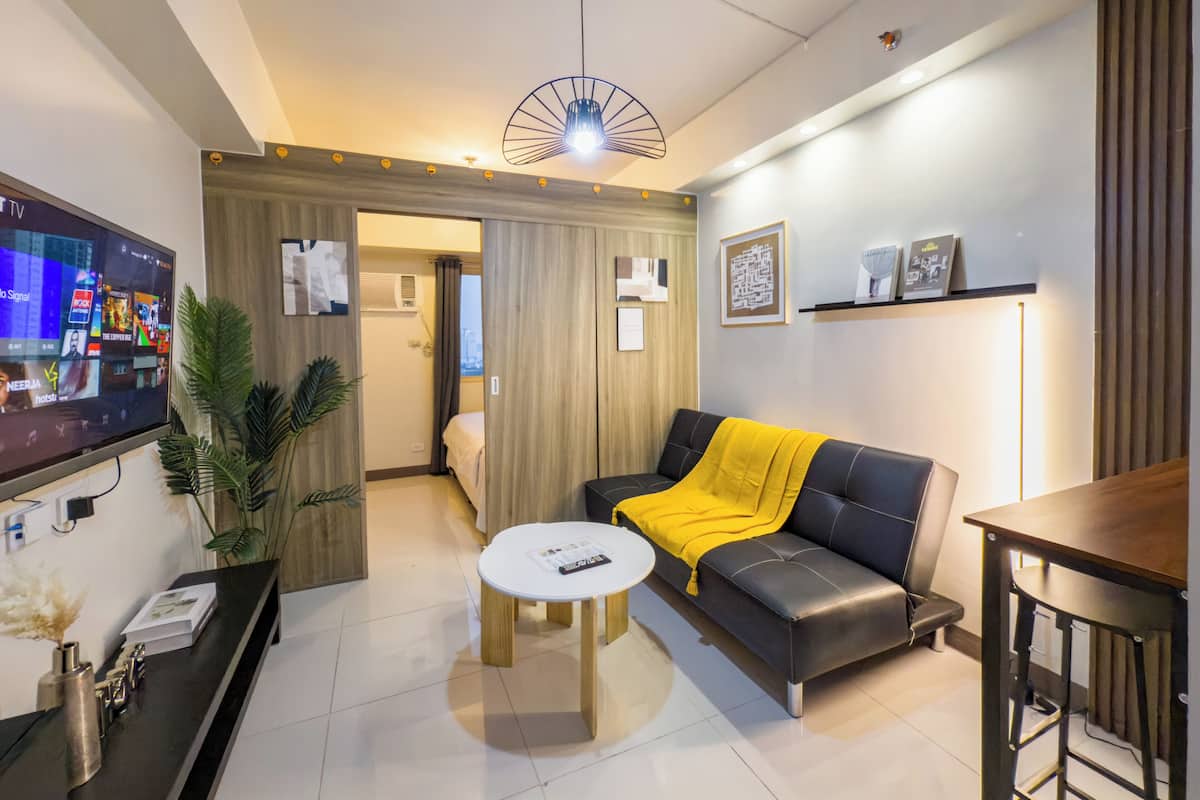 Family Condo, Kitchenette | Living area | 43-inch flat-screen TV with digital channels