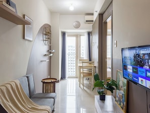 Classic Condo, Non Smoking, Bay View | Living area | 43-inch flat-screen TV with digital channels - GemstoneBR in SMDC Coast Residences (Pasay)