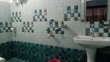 Shower, rainfall showerhead, towels, soap