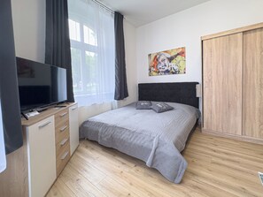 2 bedrooms, desk, iron/ironing board, travel cot