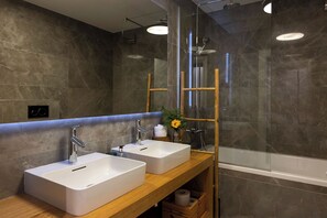 Hair dryer, towels, soap, shampoo