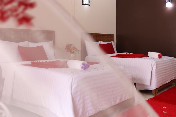 Hypo-allergenic bedding, pillowtop beds, individually furnished, desk