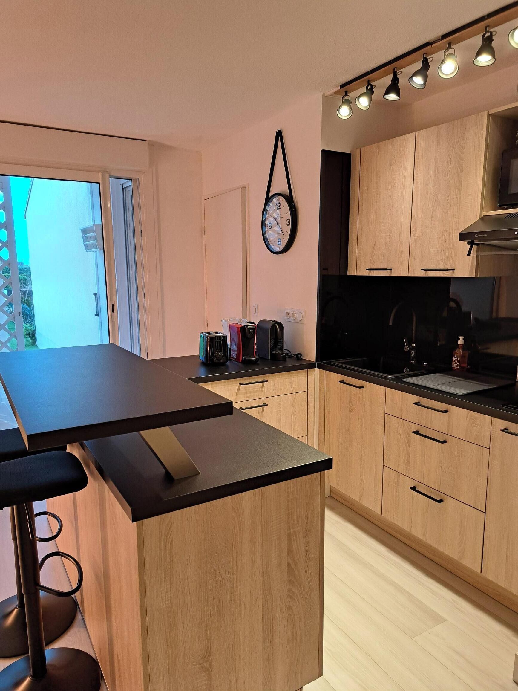 Fridge, microwave, stovetop, coffee/tea maker