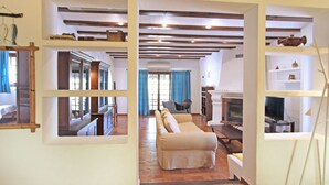 TV, fireplace - Luxury Villa with Private Pool, Garden, and Sea Views, 500m from Playa Ampolla (Moravit)