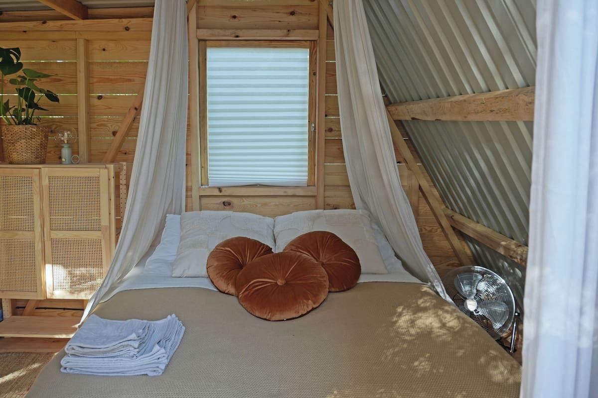 Design huisje, uitzicht op tuin | Kameruitzicht