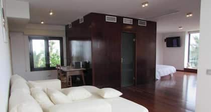 Habitación Queen Deluxe con dos Camas Queen