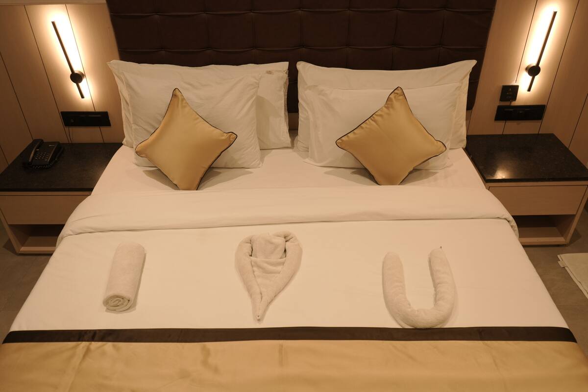 Premium kamer | Lakens van Egyptisch katoen, luxe beddengoed, een kluis op de kamer