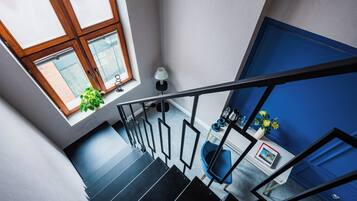 Economy Double Room | Living area | 25-inch flat-screen TV with cable channels