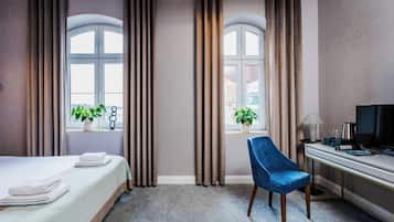 Premium Double Room | Living area | 25-inch flat-screen TV with cable channels