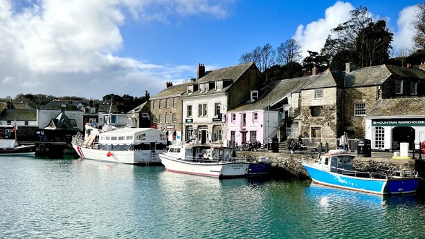 A harbor with boats docked, stone buildings, and a clear sky. - Luxury Home in the heart of Cornwall's Seven Bays area, close to Padstow  (PADSTOW)