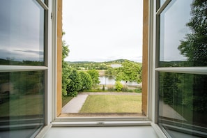 Standard Room, Garden View | 1 bedroom, desk, laptop workspace, blackout drapes