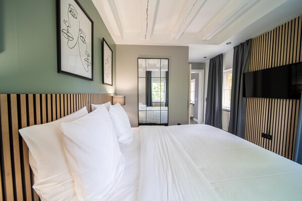 Ropa de cama de alta calidad y cortinas blackout