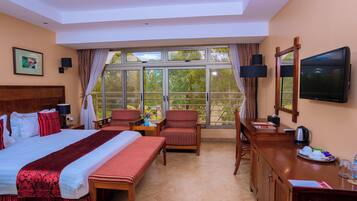 Deluxe Double Room, Garden View | In-room safe, individually decorated, individually furnished, desk
