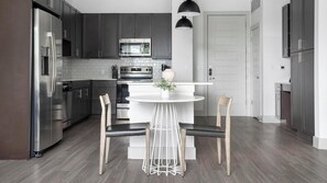 Fridge, microwave, oven, stovetop - Landing | Modern 1BD in Montopolis (Austin)