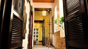 Signature Studio Suite, 1 Queen Bed, Kitchen, City View | Desk, laptop workspace, WiFi (free), individually decorated - Spice Home Homestay (Ho Chi Minh City)
