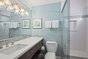Shower, hair dryer, towels, shampoo