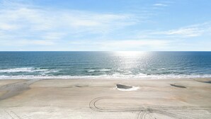 A beach with a clear sky and calm sea. - ~ Oceanfront Oasis ~  Private Condo ~ 3 Bedroom (Myrtle Beach)