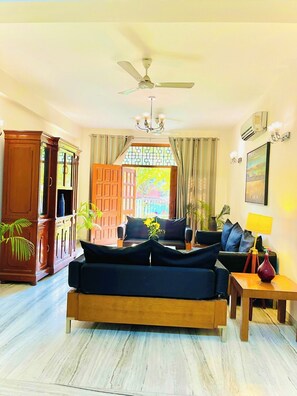 Premium Apartment | Living area | 32-inch LED TV with cable channels - BedChambers Serviced Apartments -Artemis (Gurugram)