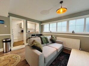 Appartement, patio (Pet friendly) | Coin séjour