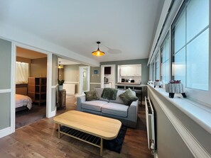 Appartement, patio (Pet friendly) | Coin séjour