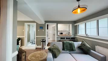 Apartment, Patio (Pet friendly) | Living area | Flat-screen TV