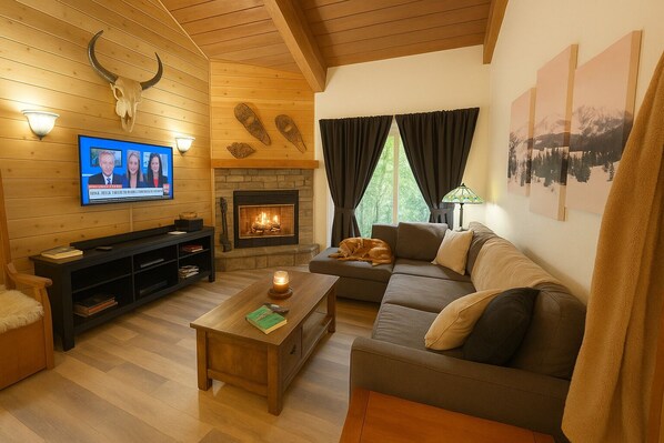 Een smart-tv, een open haard, videogames en een tafeltennistafel