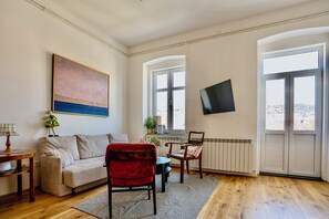 Deluxe Apartment, Balcony, City View | Living area