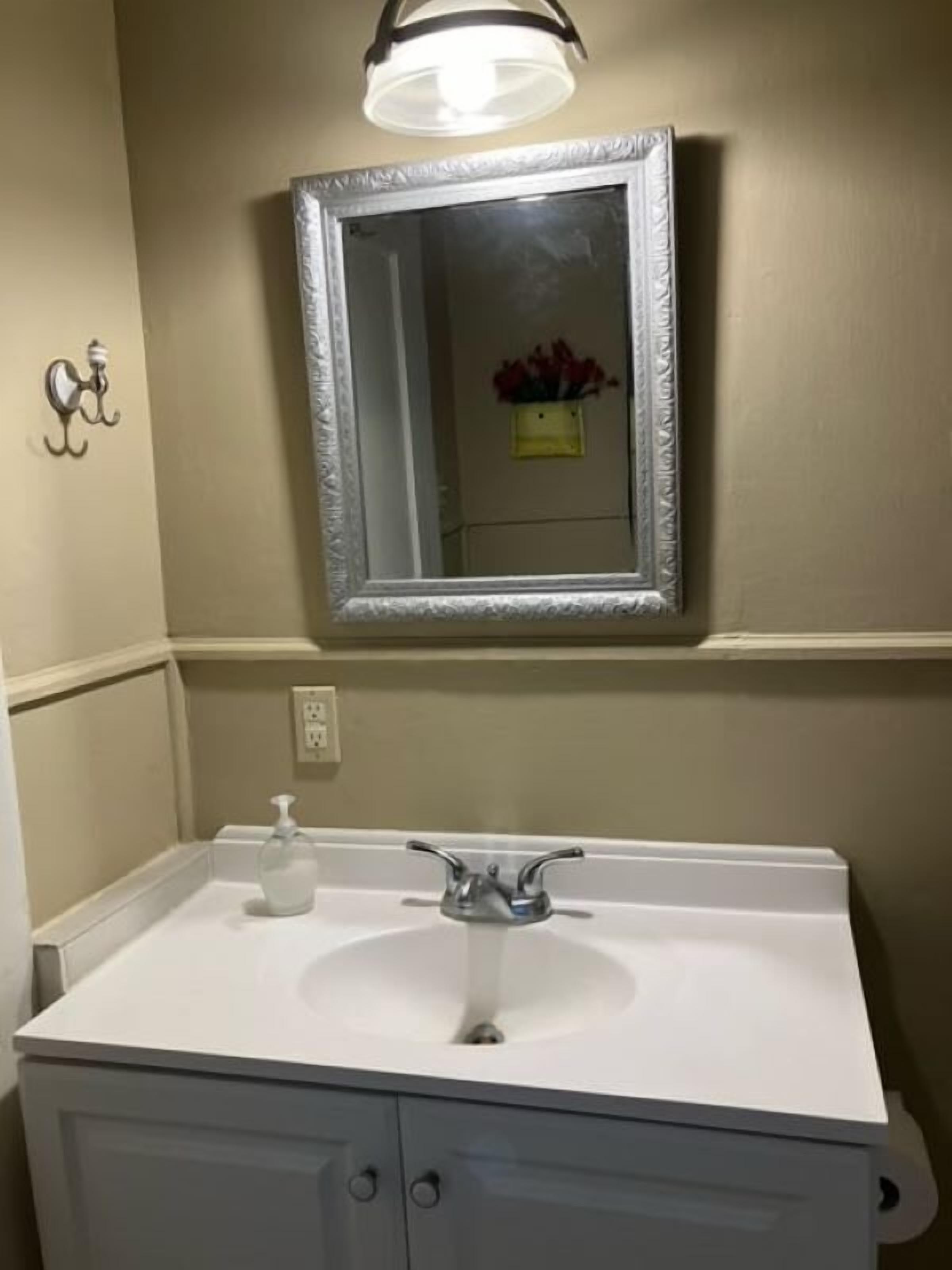 Shower, hair dryer, towels, shampoo