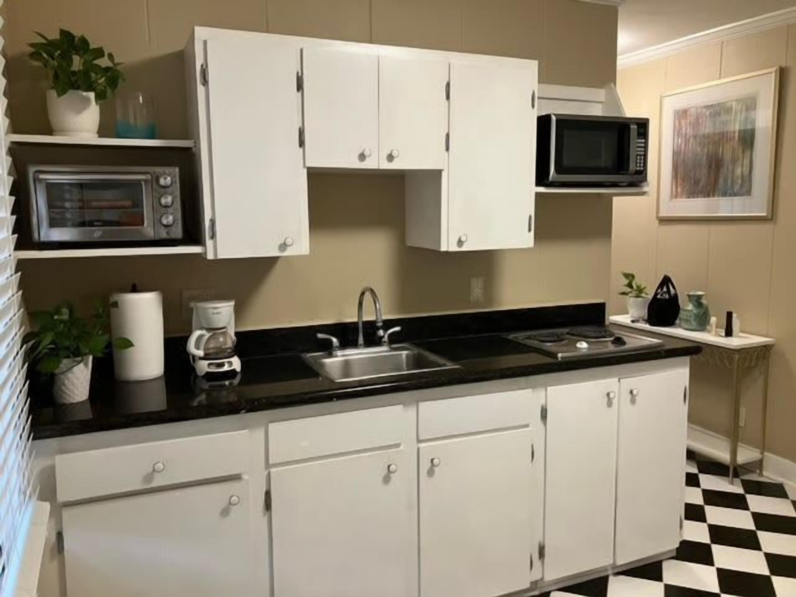 Fridge, microwave, stovetop, coffee/tea maker