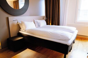 Habitación superior con 1 cama doble o 2 individuales | Wifi gratis y ropa de cama