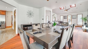 A spacious dining area with a long table, multiple chairs, and a ceiling fan. - Spacious Retreat 7 Mi to Tobyhanna State Park! (Tobyhanna)