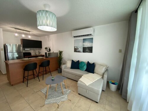 Relax at Bahía Real – Poolside Balcony Escape