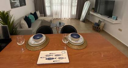 Relax at Bahía Real – Poolside Balcony Escape