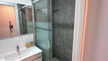 Hair dryer, towels, soap, shampoo