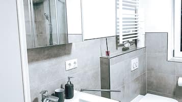 Hair dryer, towels, soap, shampoo