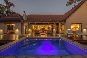 Outdoor pool, pool umbrellas, sun loungers